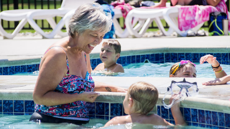 grandmother swimming with grandson
